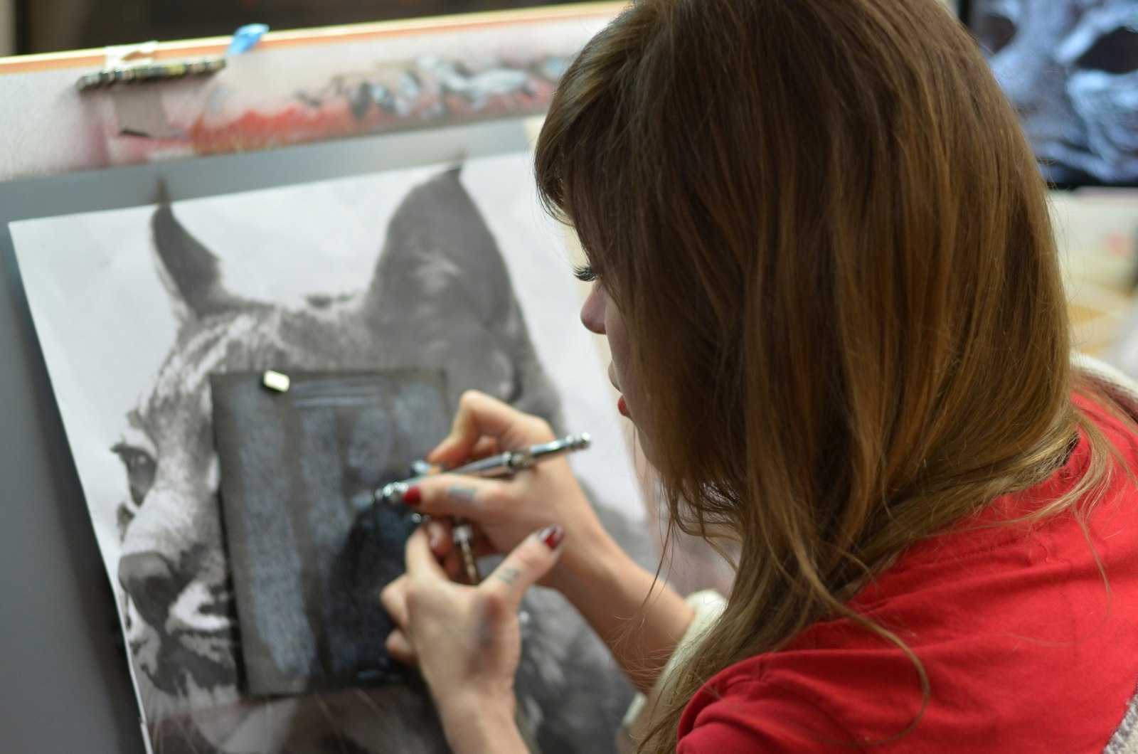 Young people participating in creative workshop activities